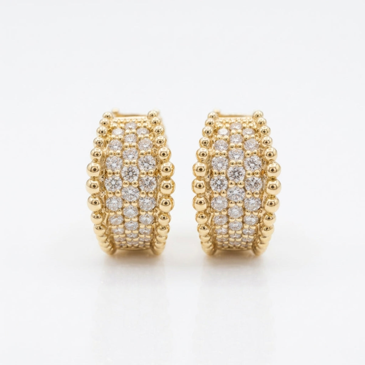 14K yellow gold Orbi Collection natural diamond and gold bead huggie earrings, front view