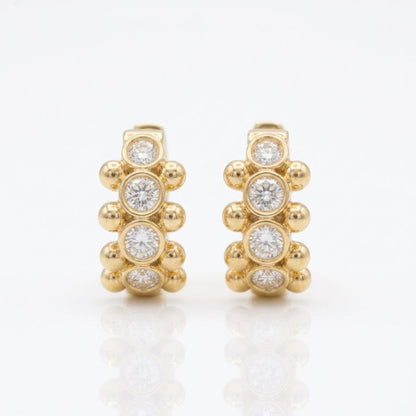 18K yellow gold Orbi Collection natural diamond bezel and gold bead huggie earrings, front view