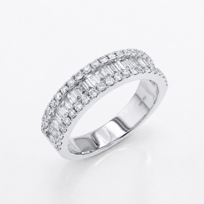 A silver-tone diamond ring with two rows of baguette and round-cut diamonds, shown on a clean white background.