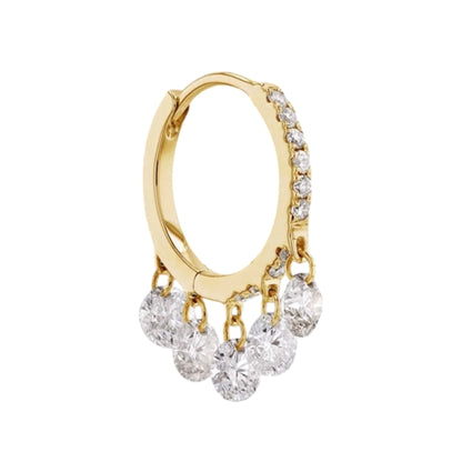 A gold huggie hoop earring adorned with small clear diamonds along the top curve and five dangling clear round diamonds at the bottom, shown on a plain white background.