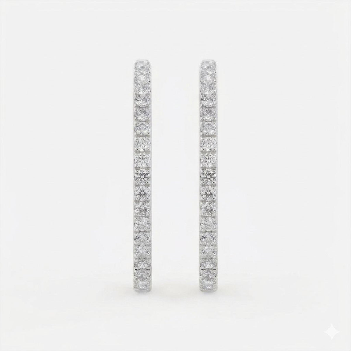 Side view of 1-inch natural diamond inside-out hoop earrings showing diamonds along the outer front and inner back.