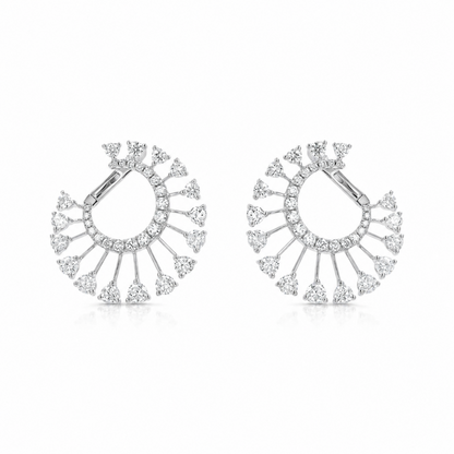 A pair of silver-toned hoop earrings decorated with multiple rows of clear pavé stones and triangular dangling accents, shown on a clean white background.
