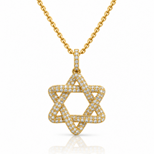 A gold Star of David pendant necklace paved with small diamonds, suspended from a gold chain on a clean white background.