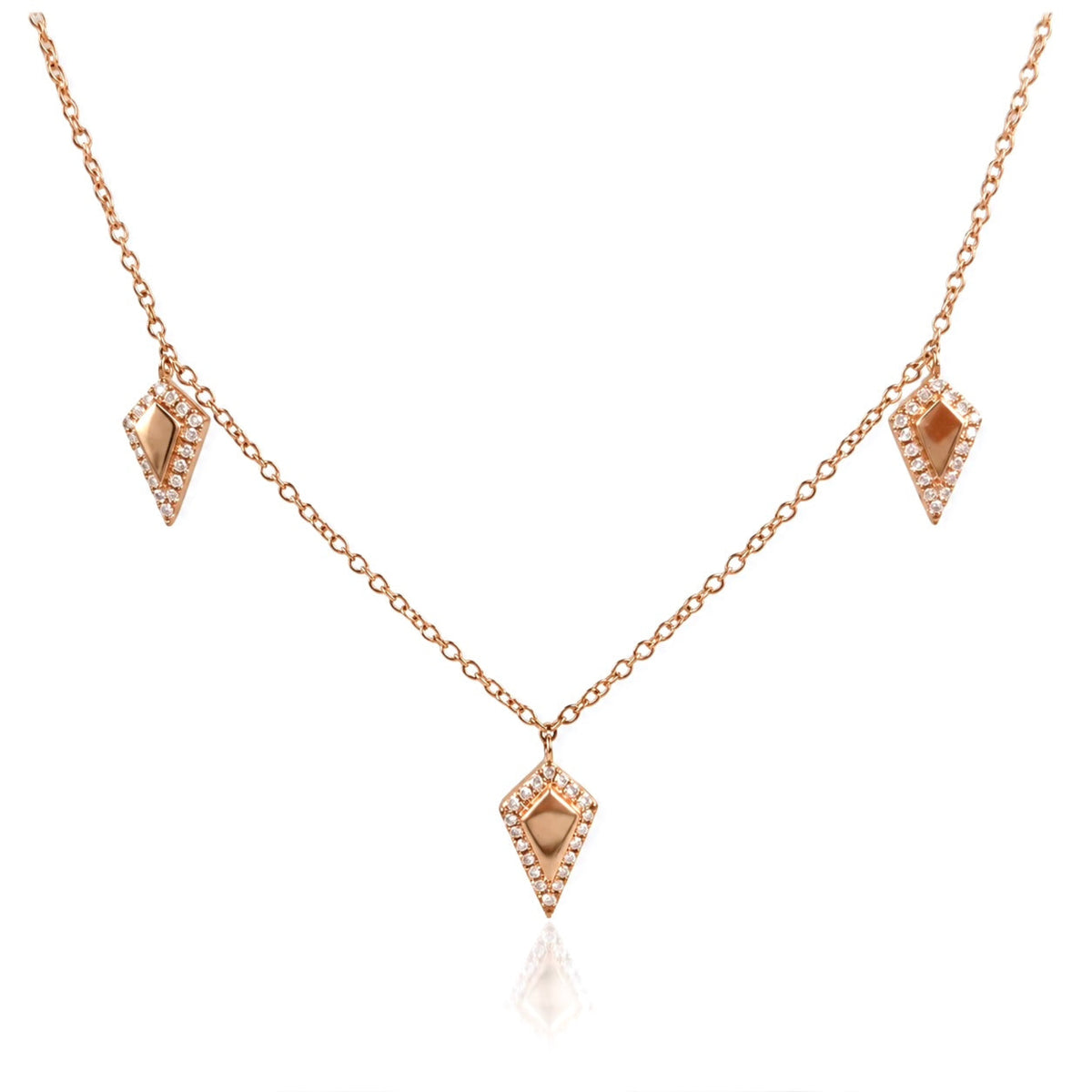 Close-up of kite-shaped charms in solid 14K rose gold with natural round brilliant diamonds.