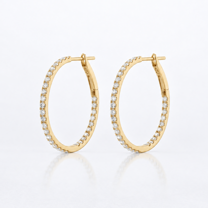 Pair of 1-inch natural diamond inside-out hoop earrings in solid 18K yellow gold.