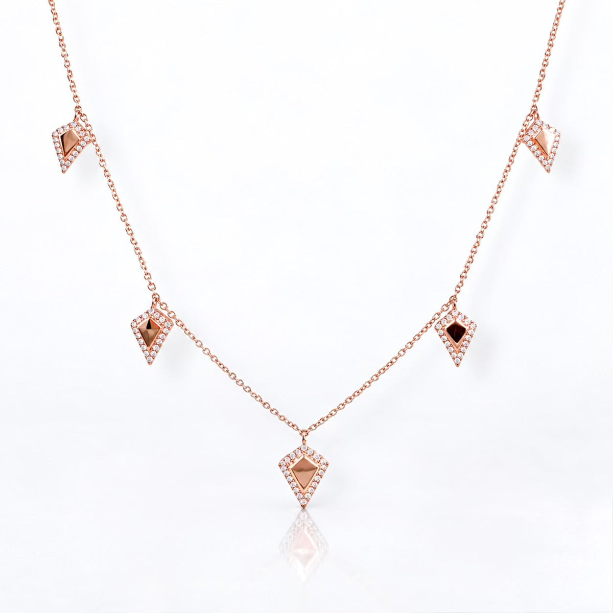 14K rose gold natural diamond necklace featuring five kite-shaped charms with 0.28 ctw G/VS diamonds.