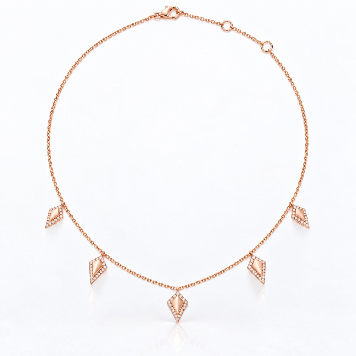 14K rose gold cable chain with lobster clasp and adjustable jump rings at 14, 16, and 18 inches.