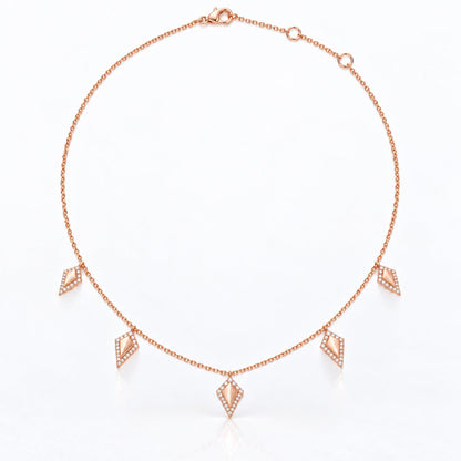 14K rose gold cable chain with lobster clasp and adjustable jump rings at 14, 16, and 18 inches.
