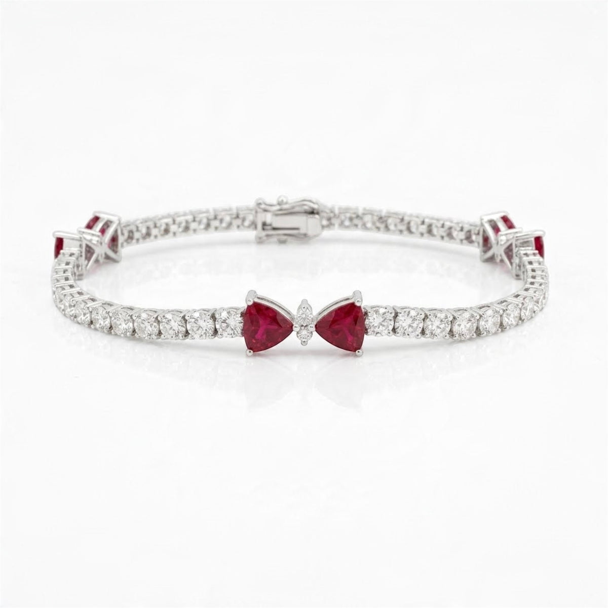 18K white gold natural ruby and diamond bow tennis bracelet, 7.58 ctw