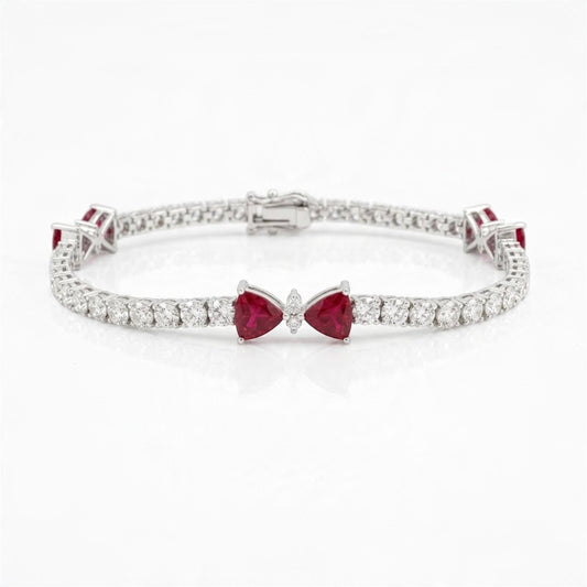 18K white gold natural ruby and diamond bow tennis bracelet, 7.58 ctw