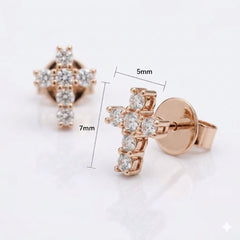 Rose gold cross stud earrings with diamond gemstones, shown with dimension labels indicating 5mm width and 7mm height on a white background.