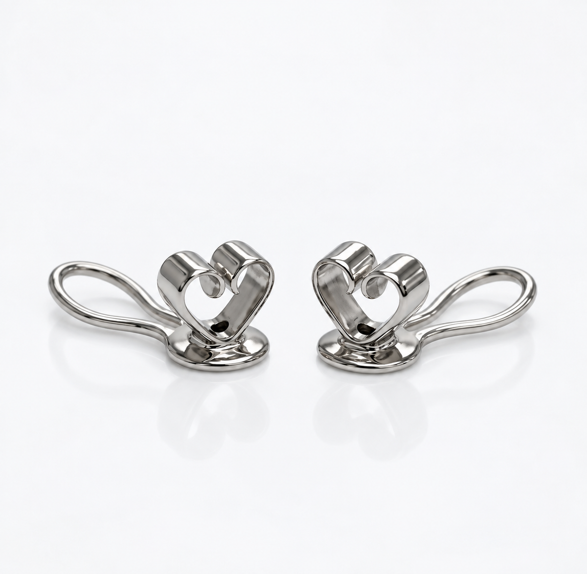 Detail of 18K white gold stabilizer wire and friction backs for floral ear climber earrings