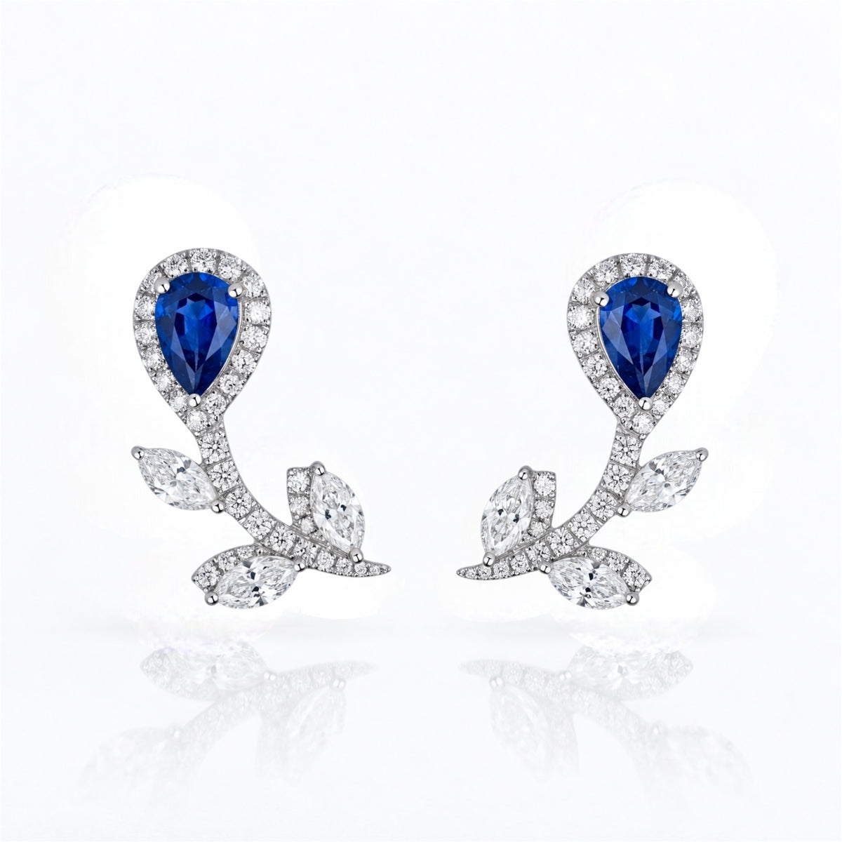 18K white gold natural blue sapphire and diamond floral ear climber earrings, front view