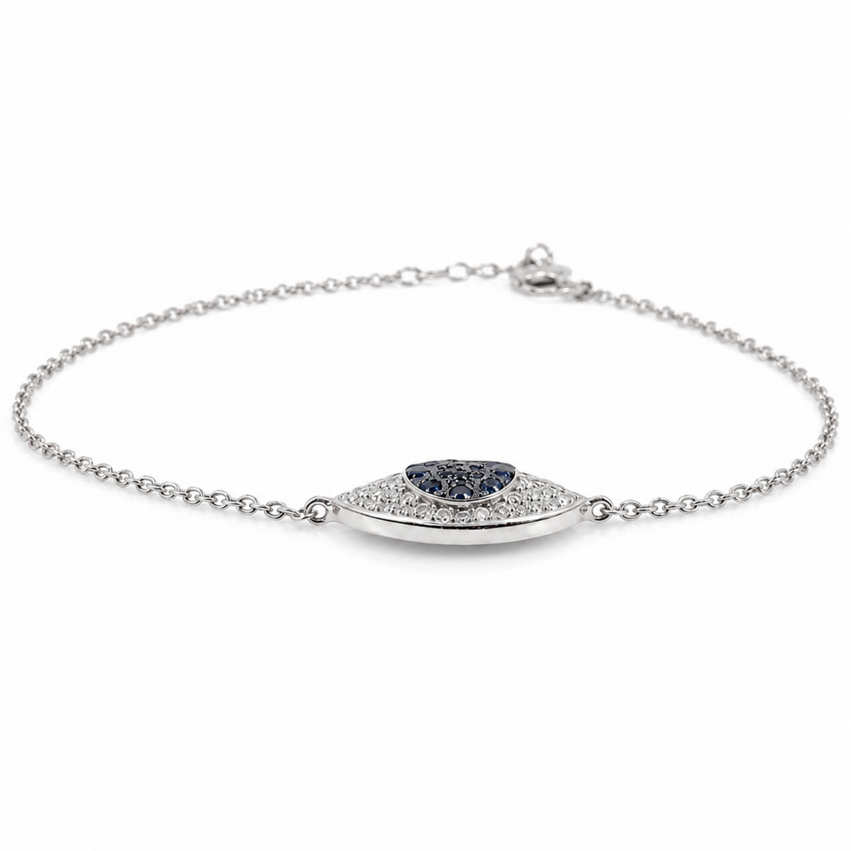A silver chain bracelet with a central pavé heart-shaped bezel holding a dark blue marquise-cut gemstone, displayed on a clean white background.