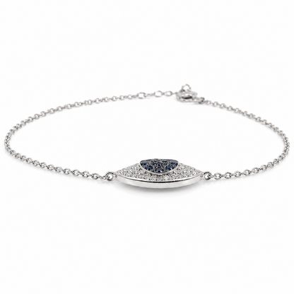 A silver chain bracelet with a central pavé heart-shaped bezel holding a dark blue marquise-cut gemstone, displayed on a clean white background.