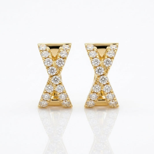 Pair of solid 14K yellow gold natural diamond X huggie hoop earrings featuring an X-shaped diamond design.