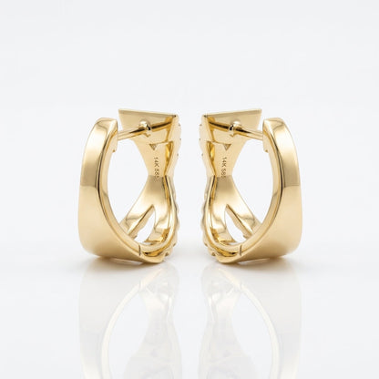 Back view of solid 14K yellow gold X huggie hoop earrings showing the polished gold construction and hinged post closures.