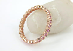 2.2mm Bezel Set Round Pink Sapphire Eternity Band in 18k Rose Gold