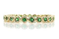 2.2mm Bezel Set Round Tsavorite Eternity Band in 14k Yellow Gold
