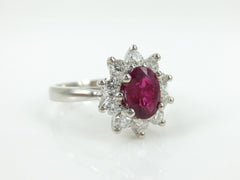 Oval Ruby and Diamond Halo Ring, 18K White Gold