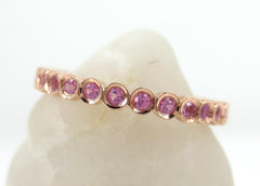 2.2mm Bezel Set Round Pink Sapphire Eternity Band in 18k Rose Gold