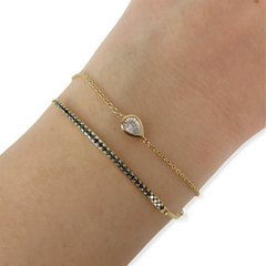 Black Diamond Bar Bracelet set in 18K Yellow Gold.