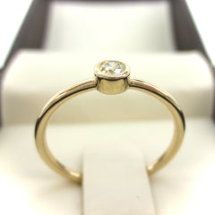 0.07 cts Bezel-Set Solitaire Yellow Diamond Ring - 14K Yellow Gold