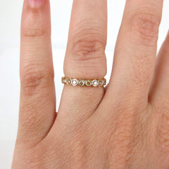 Bezel-set Round Yellow Diamond Eternity Band - 18K Yellow Gold