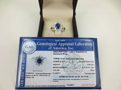 Oval Sapphire and Diamond Halo Ring, 18K White Gold